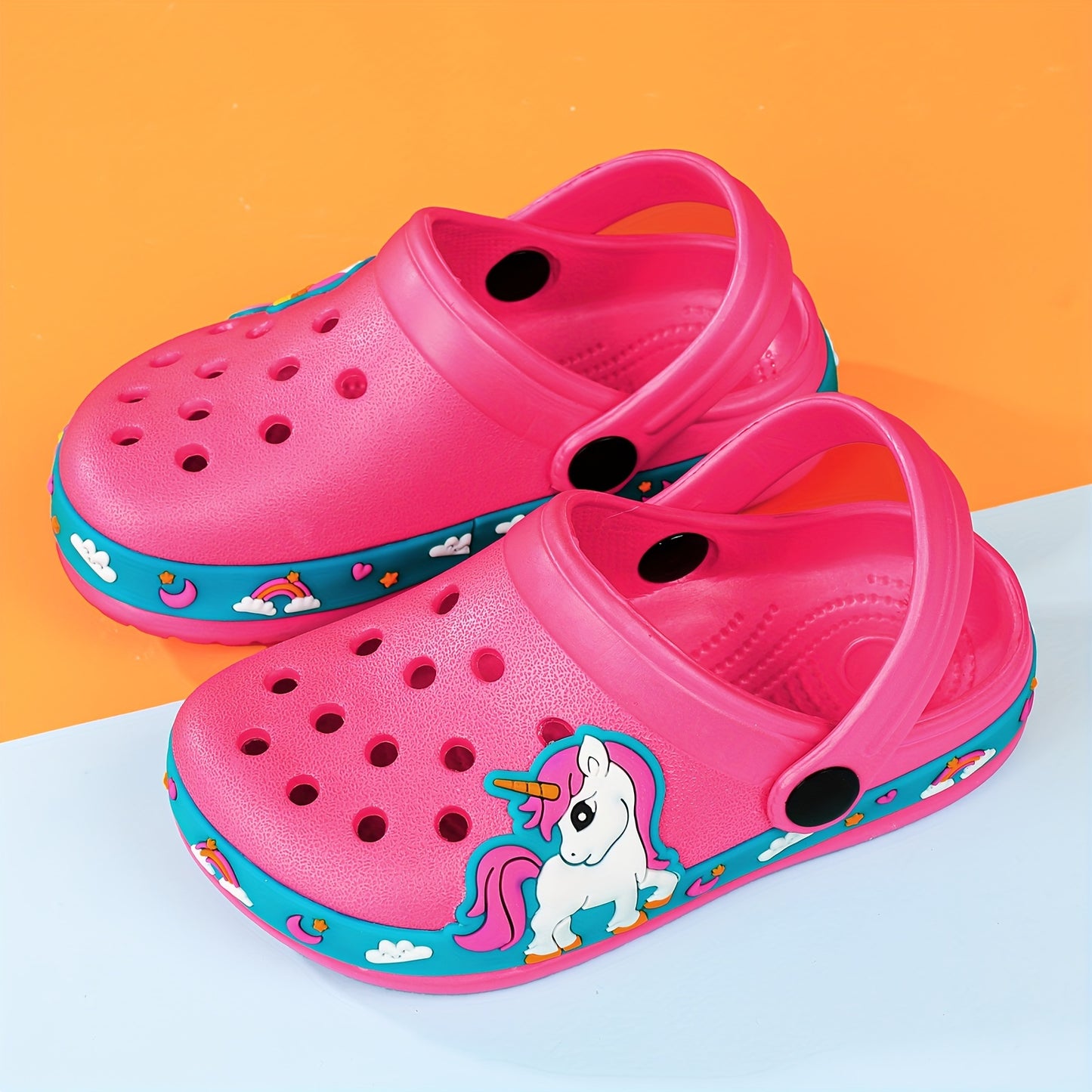 Toddler girls' cartoon print platform clogs with closed toe, anti-skid soles, and hollow out design – perfect for outdoor play.