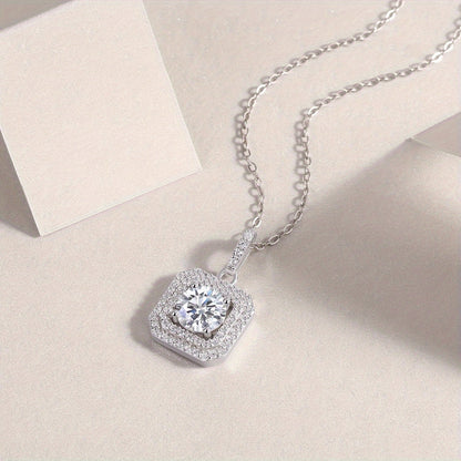 This stylish Moissanite pendant necklace is made of 925 sterling silver and coated with 18K gold, featuring a square halo design. It comes on a collarbone chain and includes a gift box, making it perfect for Valentine's Day, engagements, weddings