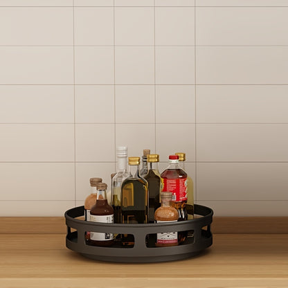 Rotating organizer for tableware, makeup, and spices to save space on countertops with non-slip design.