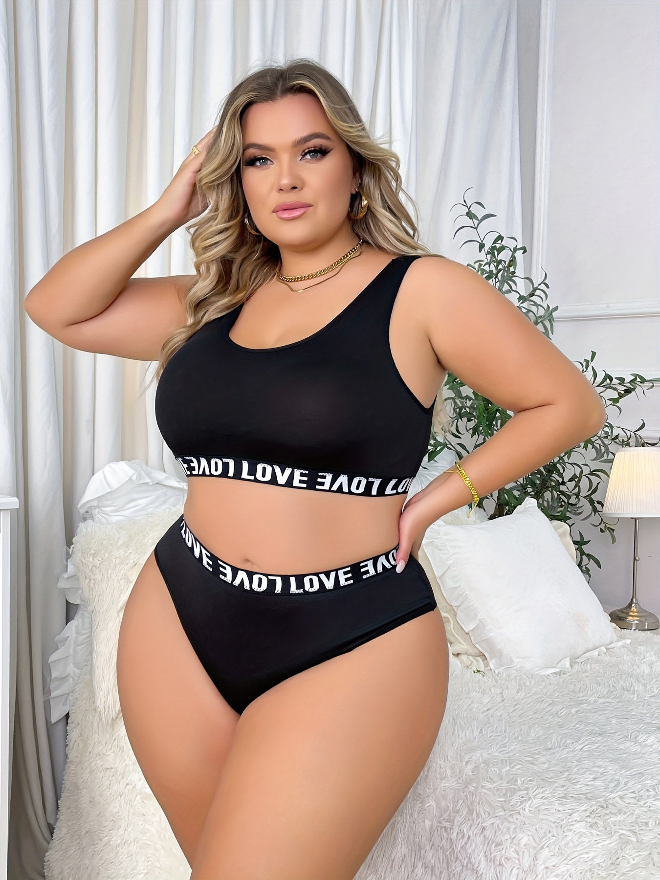 Women's plus size simple lingerie set includes a seamless bra and panty with contrast letter tape.