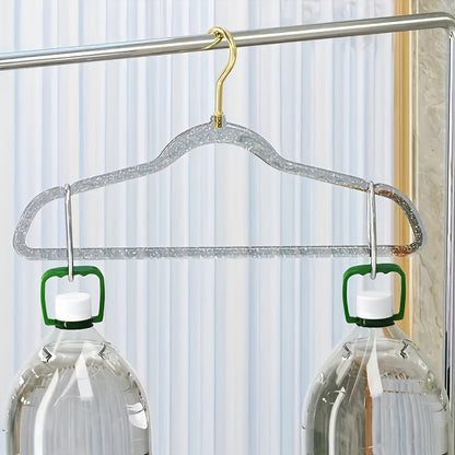 A set of 12 premium acrylic hangers with a non-slip, sparkling transparent design, providing a firm grip for wardrobe storage. These durable, thick hangers are perfect for bedroom closets, offering a traceless hanging solution.