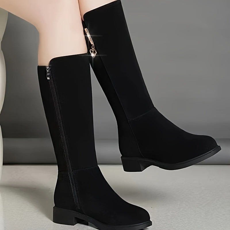 Winter knee-high boots for women with faux fur lining, low heel, rubber outsole, and soft fabric insole, ideal for casual and stylish outings.