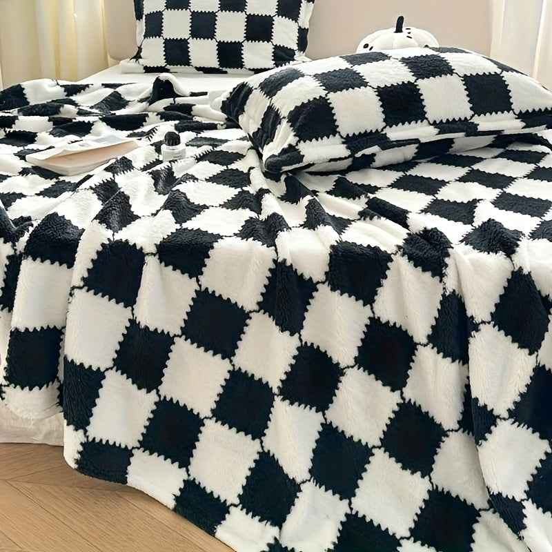 Soft and cozy plaid flannel throw blanket, perfect for staying warm on the couch, napping in the office, or traveling. Features a versatile checkerboard design and is machine washable for easy care.