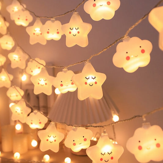 Star and cloud string lights require batteries (not included).