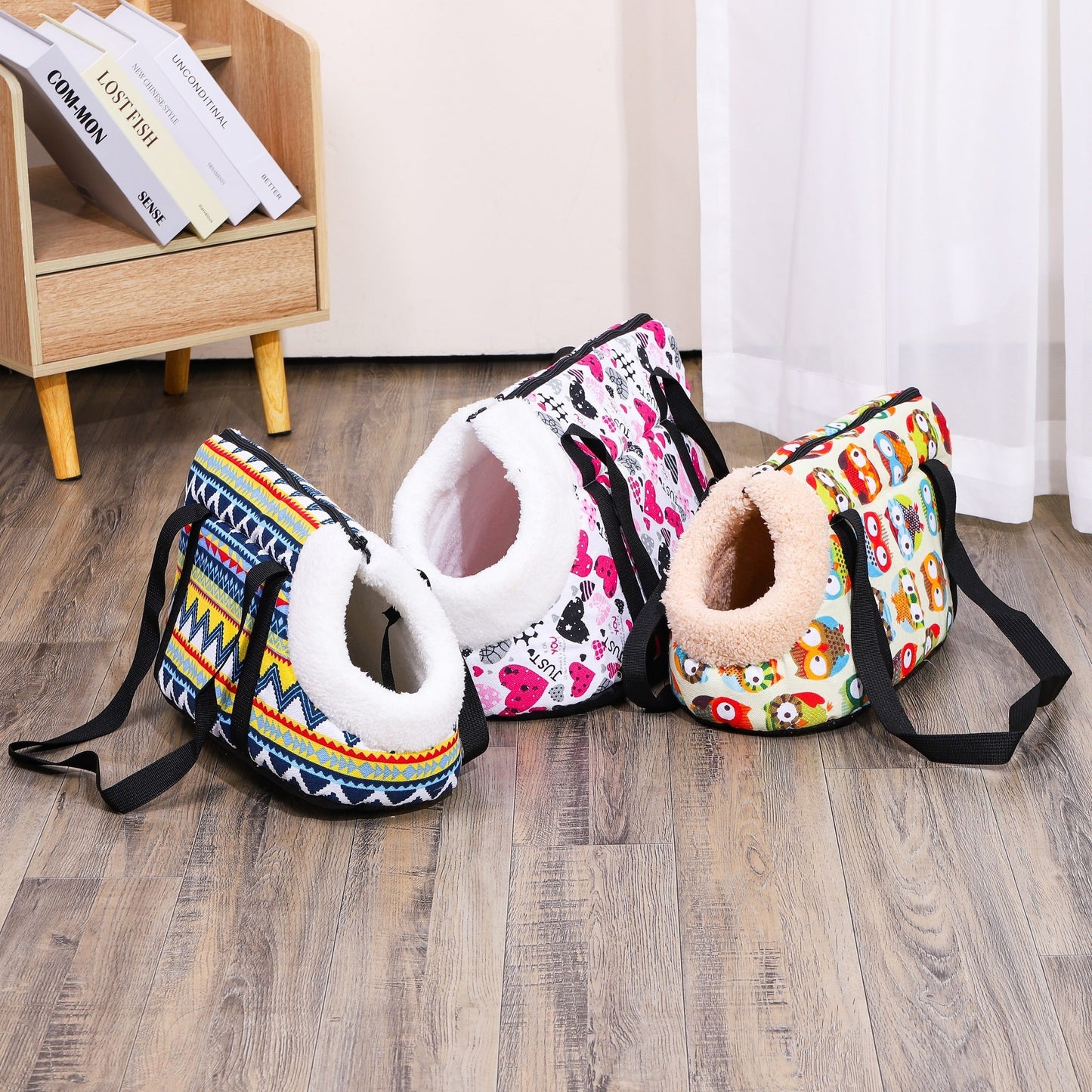 Washable, portable cat carrier bag in multi-colored design, perfect for small to medium cats. Features zippered closure and disassembled for easy litter outings.