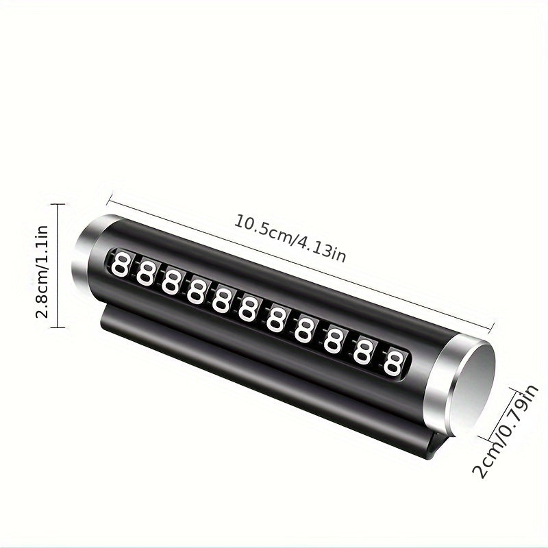 Device for temporarily moving the mobile phone number plate on a car. Fits inside car and has 11-digit number.