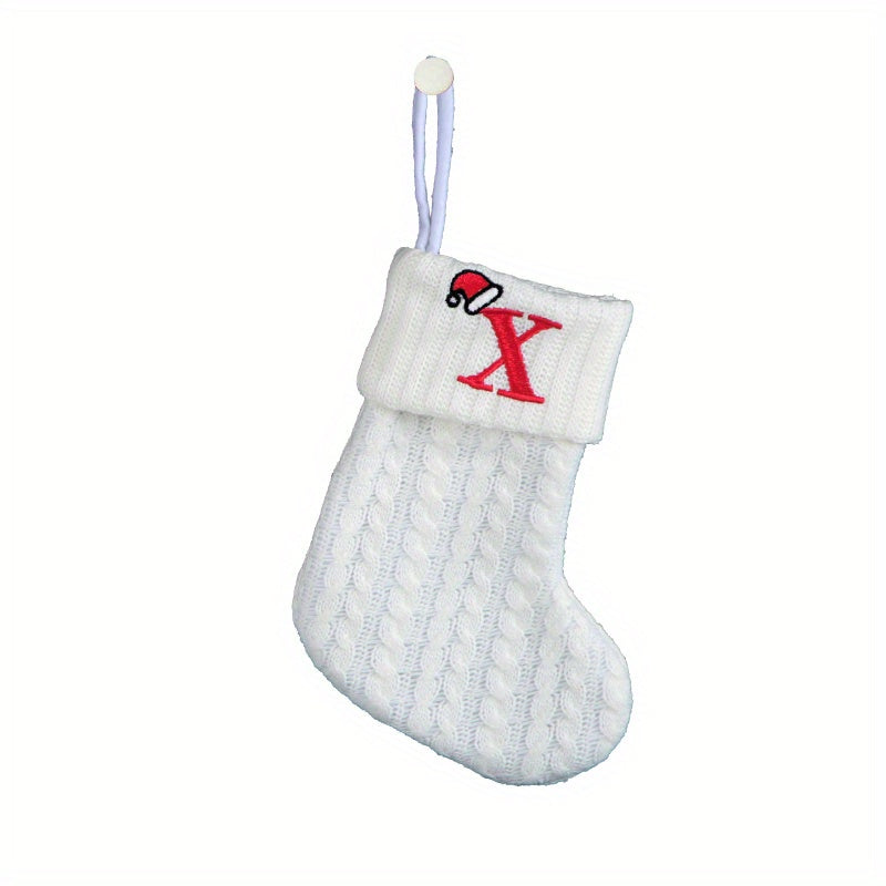 White cable knit stocking with embroidered 'F' - Ideal for indoor decor.