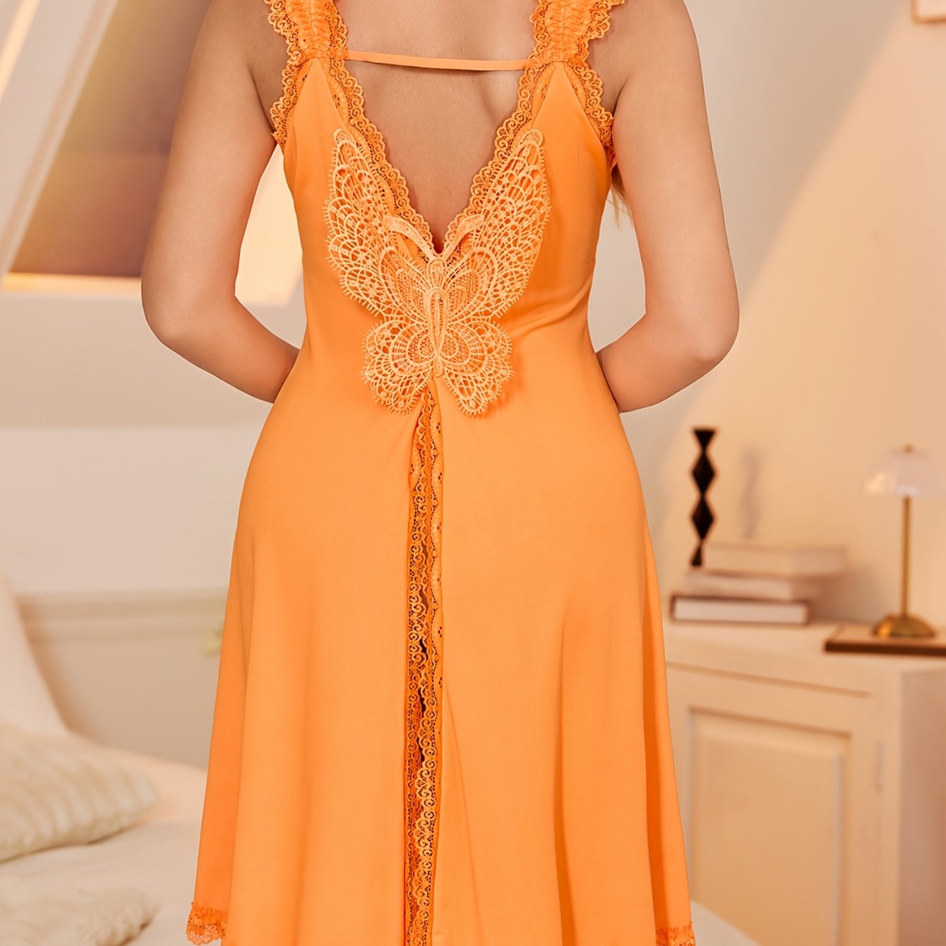 Butterfly lace sleepwear dress with V-neck and split hem for women, a comfortable nightgown.