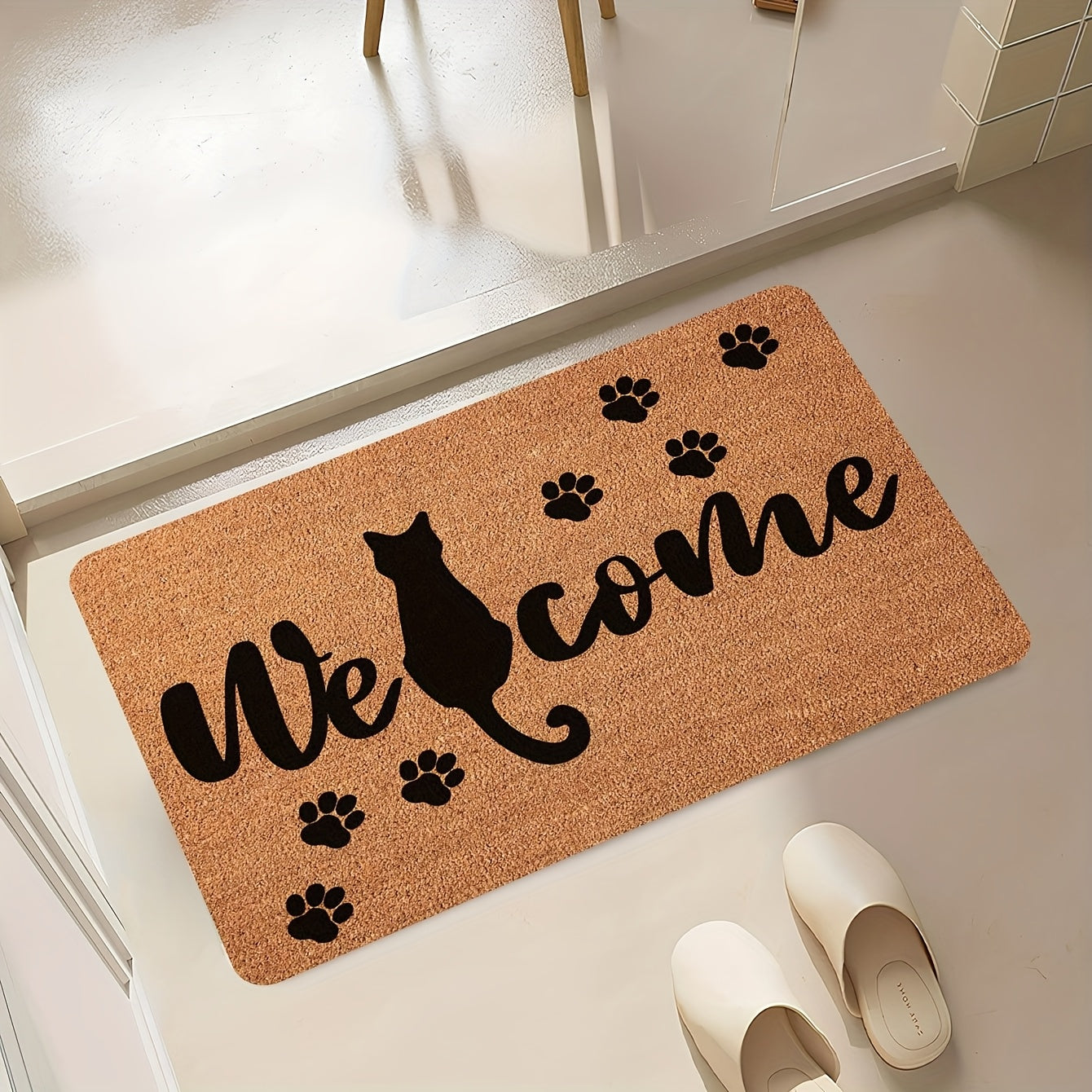 Introducing the Whisker Wonders Cat Welcome Doormat, a durable and stylish addition to your home. Made of stain-resistant polyester material with a charming black cat silhouette, this mat is perfect for both indoor and outdoor use. Easy to clean with a