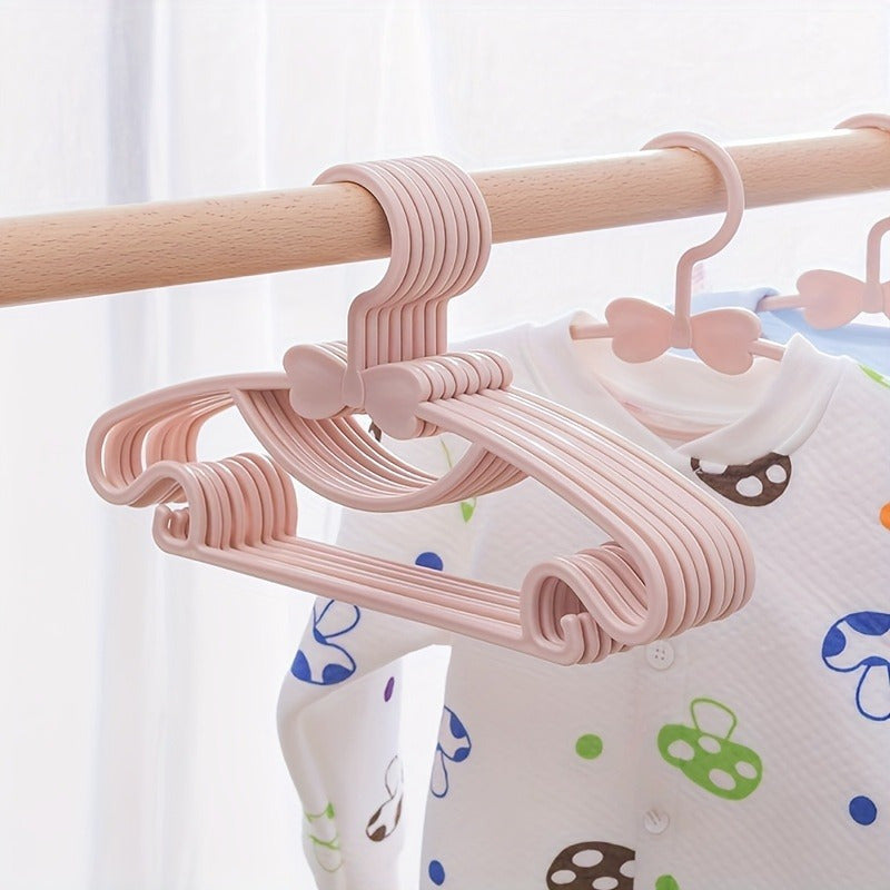 10 to 20 pieces of plastic hangers for storing youngsters' clothes. These durable anti-slip hangers can also be used as clothes drying racks, perfect for household storage organization in the bathroom, bedroom, closet, wardrobe, home, dorm, and more.