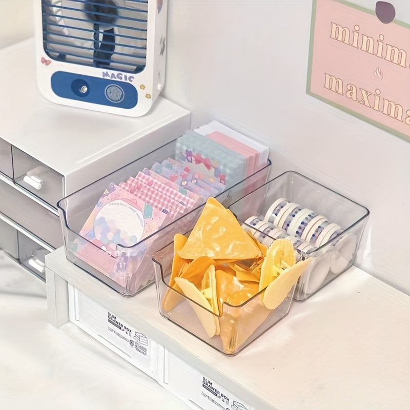 Two sizes of transparent acrylic drawer storage boxes available for organizing stationery in student dormitories.