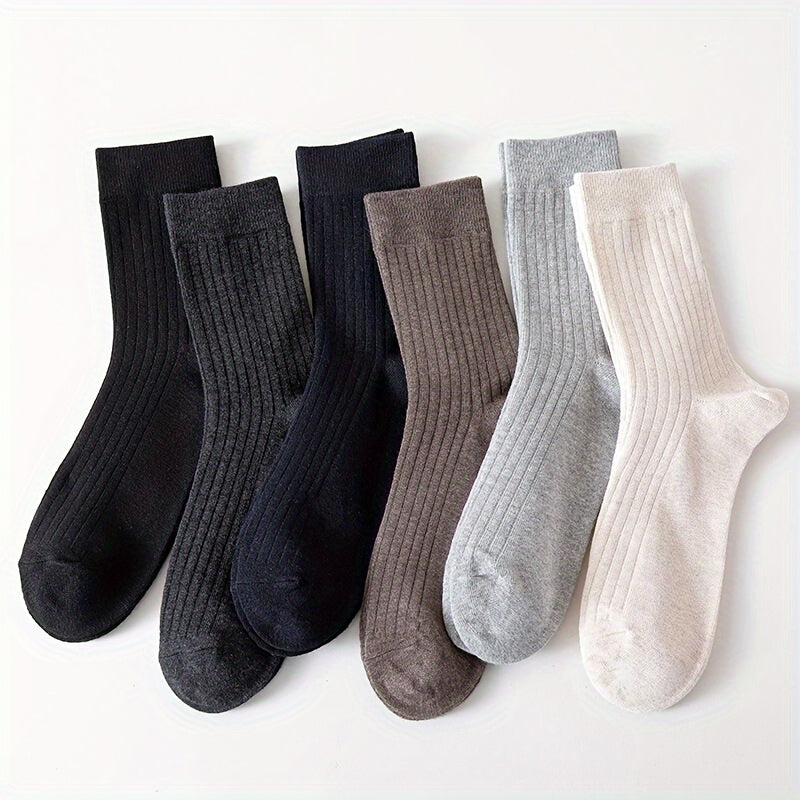 5 pairs of men's trendy solid crew socks, suitable for outdoor wear in all seasons.