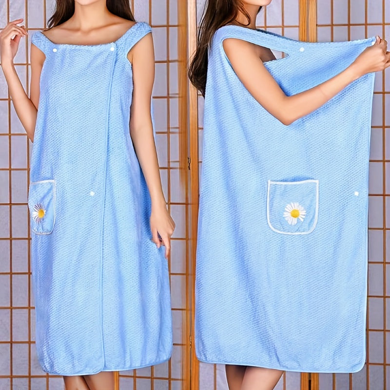 Adults' wearable bath towel features pockets, buttons, and quick-drying, absorbent material. Perfect for home spa or sauna use.