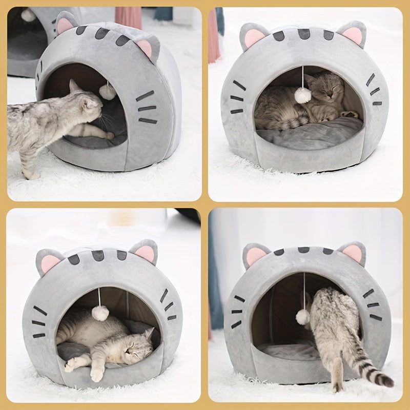 Gray hooded cat bed with pink ears, soft interior, and washable cushion - ideal for snuggling and napping indoors.