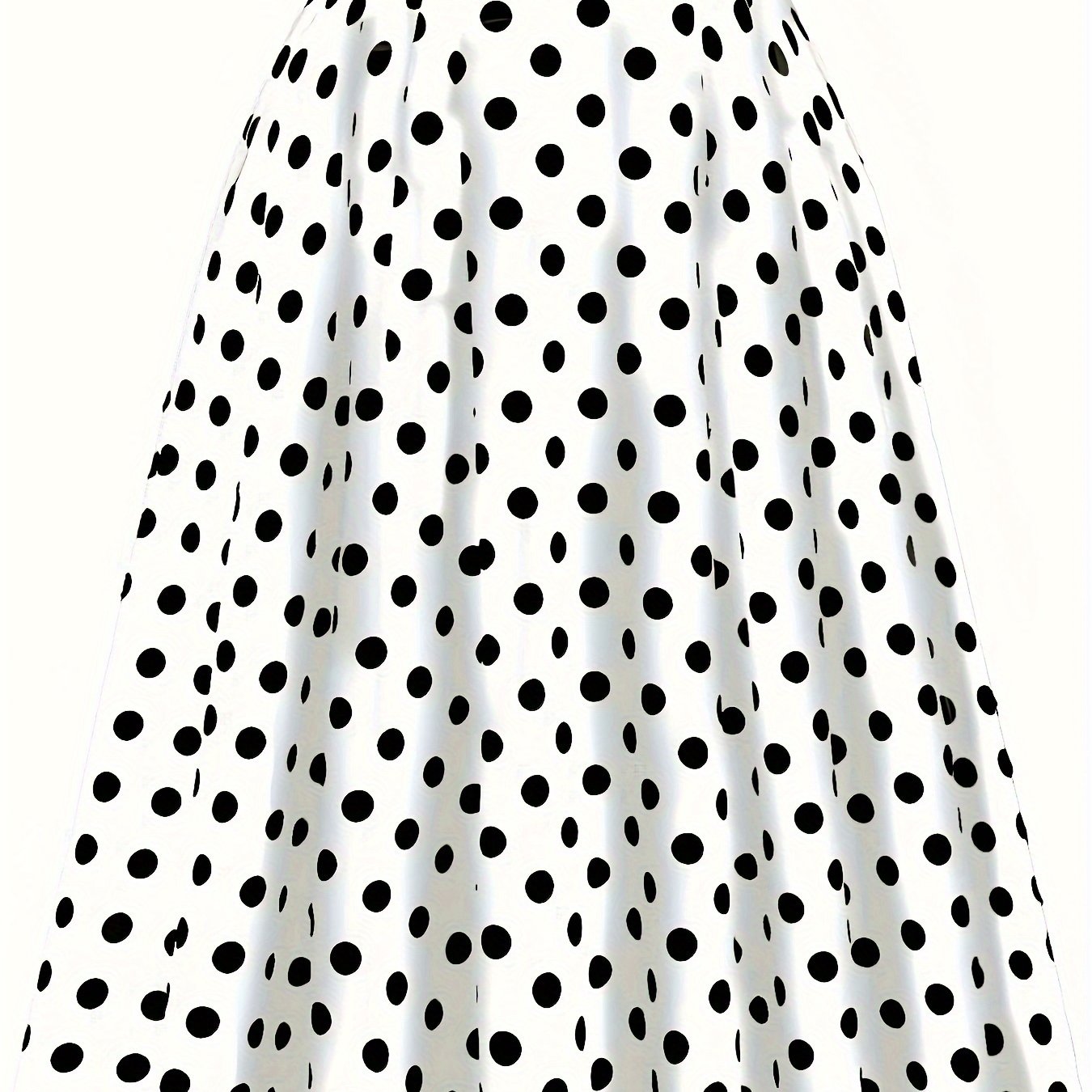 High waist flared skirt with polka dots and ruffled hem.