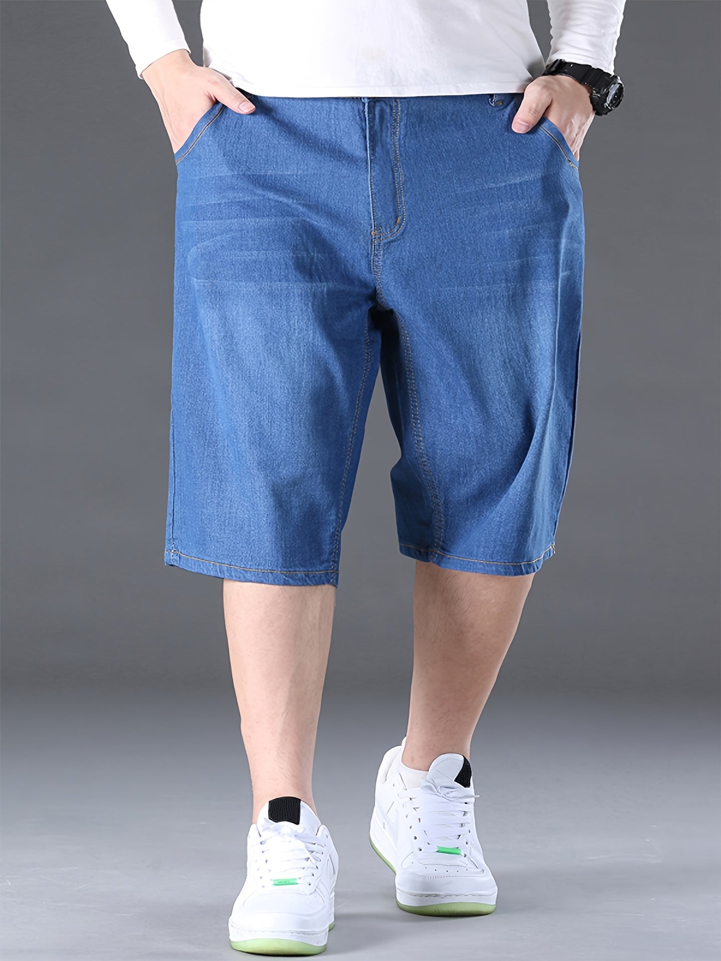 Stylish summer denim shorts for plus-size men in blue.