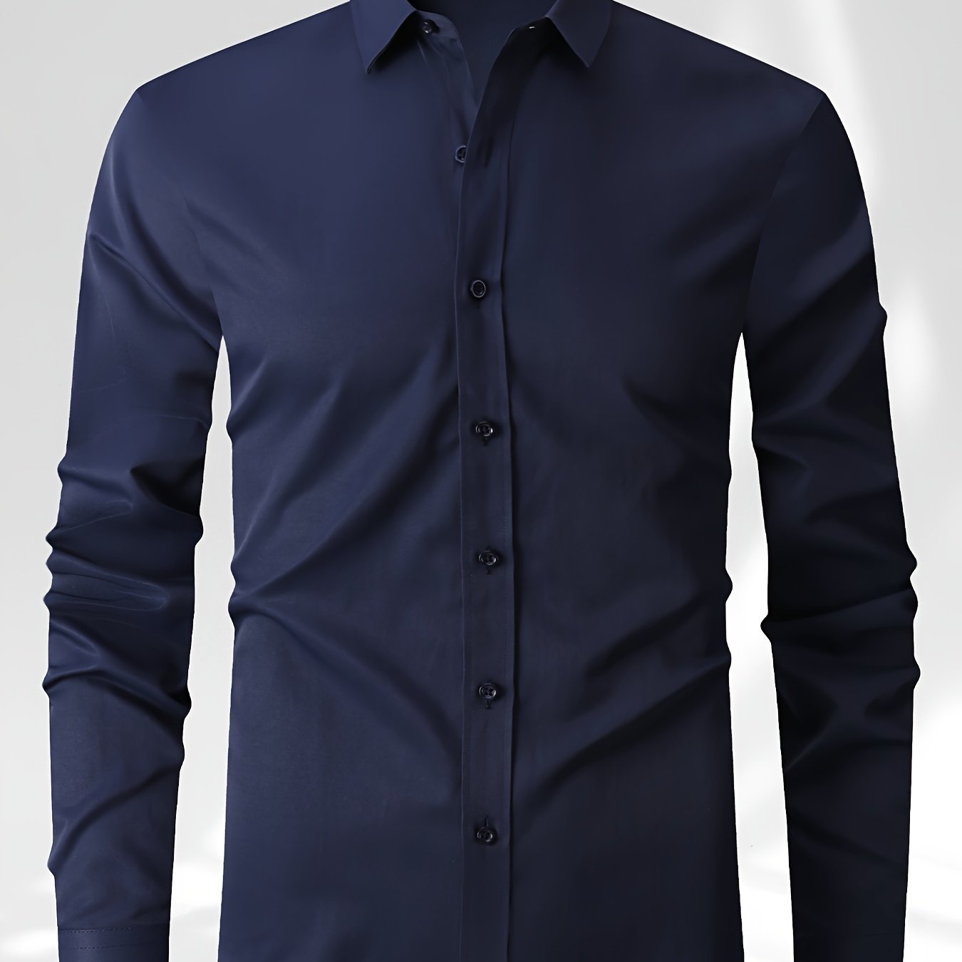 Classic men's button-down dress shirt in solid color, suitable for business casual office wear in the spring season.