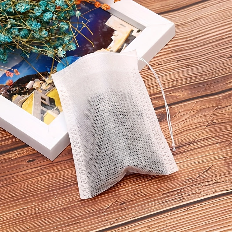 100 high-quality tea bags made from wheat straw - a great choice for brewing loose leaf tea, herbs, and spices. Perfect for use in homes, restaurants, and kitchens.