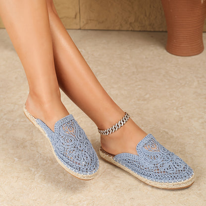 Huizhou's Summer Floral Mules for Women: Lightweight vacation slides with embroidered detailing, round toe, and flat heel, ideal for the beach.