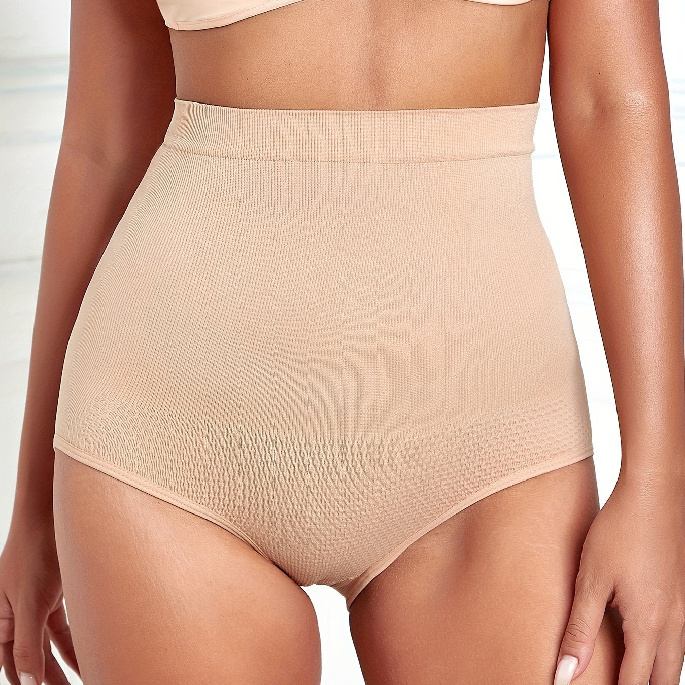 High waist solid briefs that are comfy, seamless, and slimming, ideal for women's lingerie and underwear.