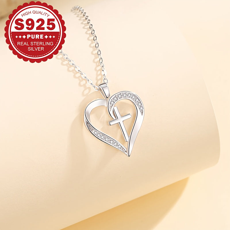 Elegantly designed heart cross pendant necklace made of Sterling Silver S925, adorned with Synthetic Zirconia. Hypoallergenic and lightweight at 4.5g, ideal for everyday wear or as a special Valentine's Day gift. Presented in a gift box for easy gifting.