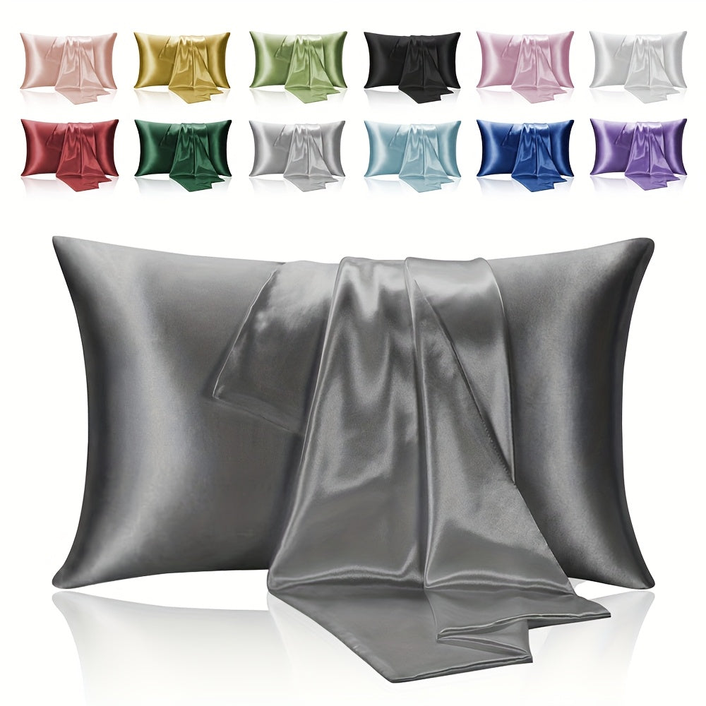 Two-pack of luxurious silky satin pillowcases, made from ultra soft smooth polyester with an envelope closure design. Available in solid colors, these machine washable pillow covers are lightweight at 80-85gsm, providing cooling comfort for hair and