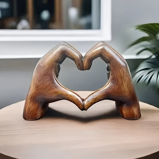 Heart-shaped resin sculpture for home or office decor. Perfect gift for holidays or special occasions.