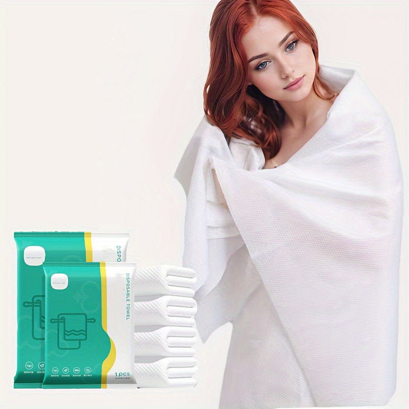 Disposable folding bath towel in portable packaging, enlarged and thickened for strong water absorption. Skin-friendly, soft, and suitable for business trips, travel, camping, and beach vacations.