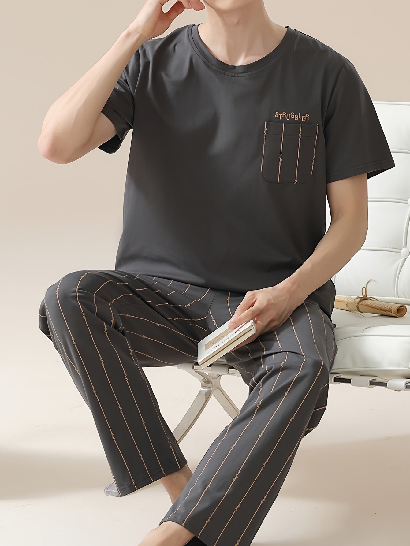 Men's 2-piece simple pocket round neck short sleeve pajama set with striped trousers. Comfortable and skin-friendly for cozy loungewear.