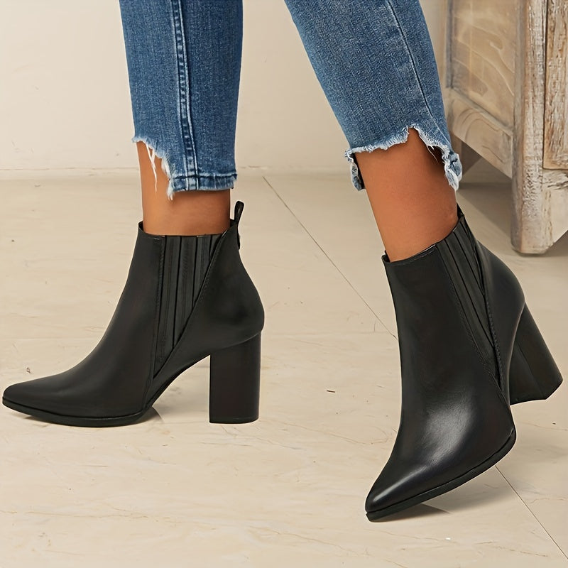 Trendy slip-on ankle boots in solid colors with chunky heels and a pointed toe.