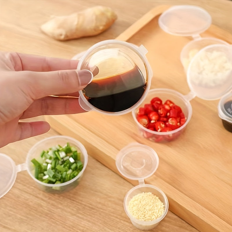 50 transparent disposable sauce boxes for takeout, packaging, and seasoning. These multipurpose food storage boxes come with covers.