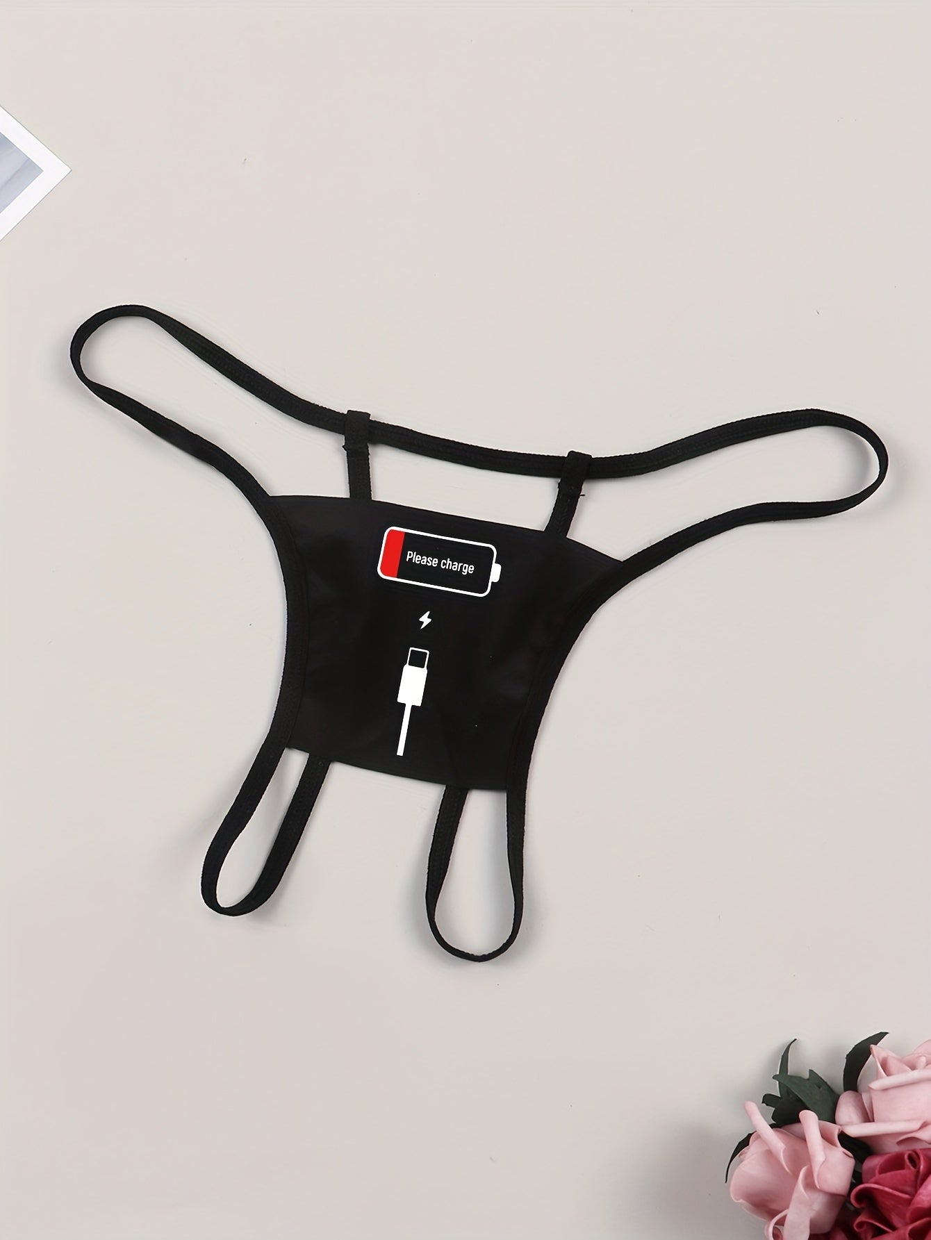 Graphic printed open crotch thongs with low waist V string design, ideal for women's sexy lingerie and underwear.