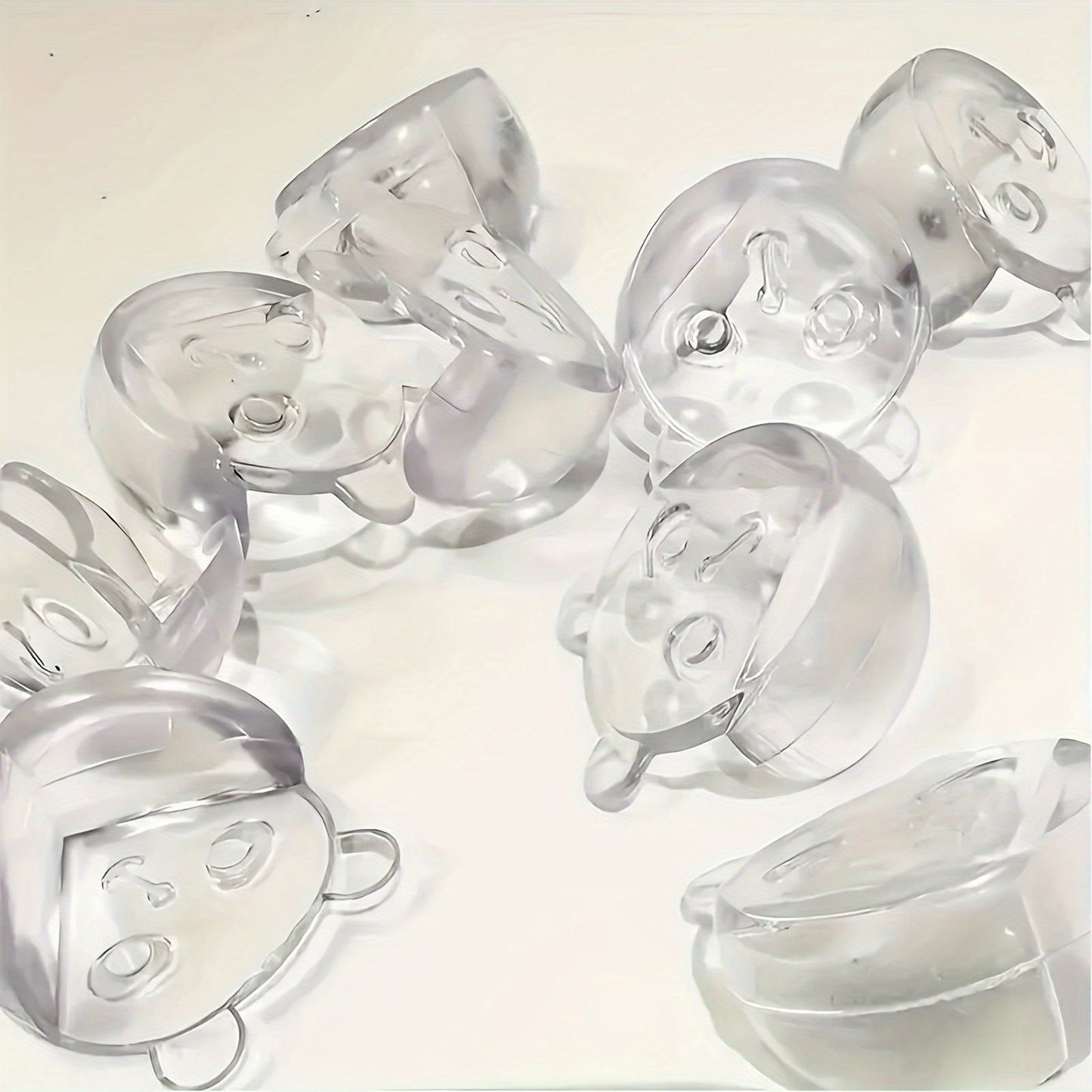 12 to 20 pieces of Anti-collision Corner Protectors featuring Safety Bear Head design, made with Thickened Transparent material to cover table corners.