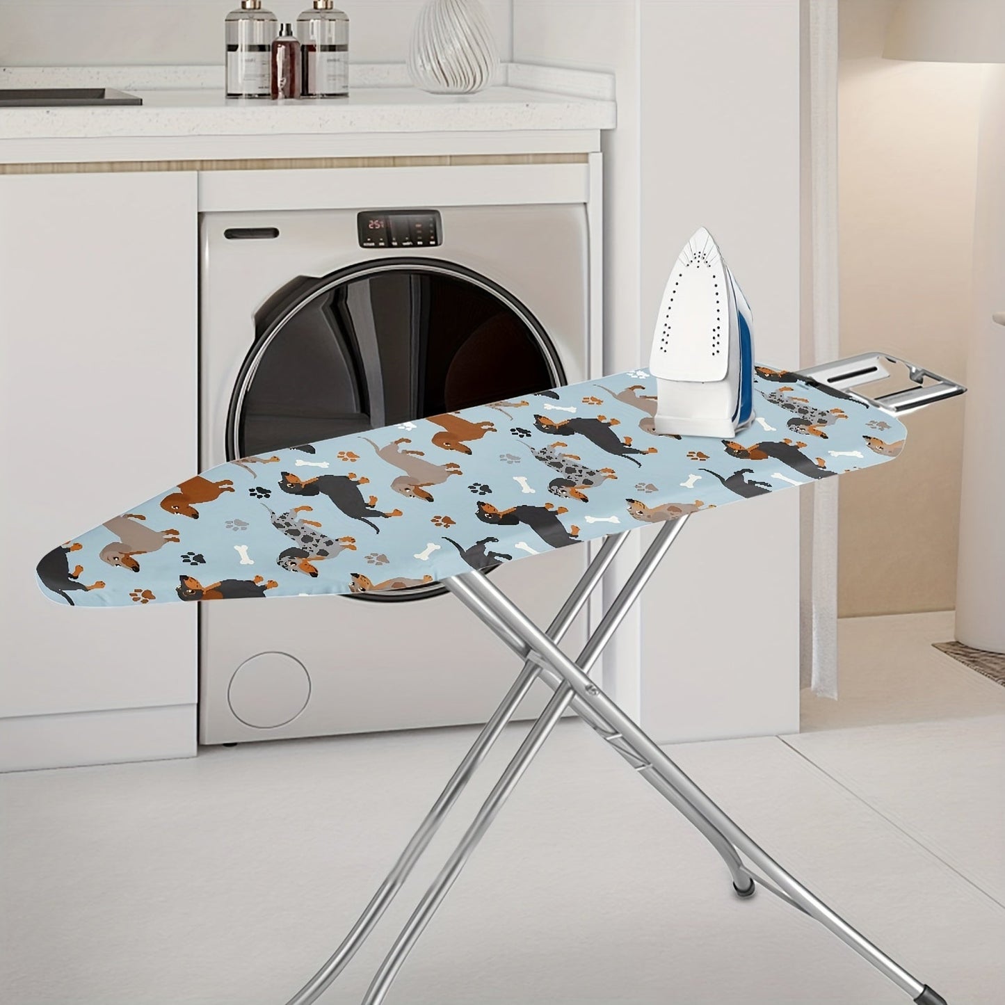 Ironing board dustproof cover with a clear design featuring a dachshund dog pattern. Ideal for replacing old cloth covers on household ironing boards. Perfect for electric iron boards and comes in one piece. Can also serve as a protective accessory for