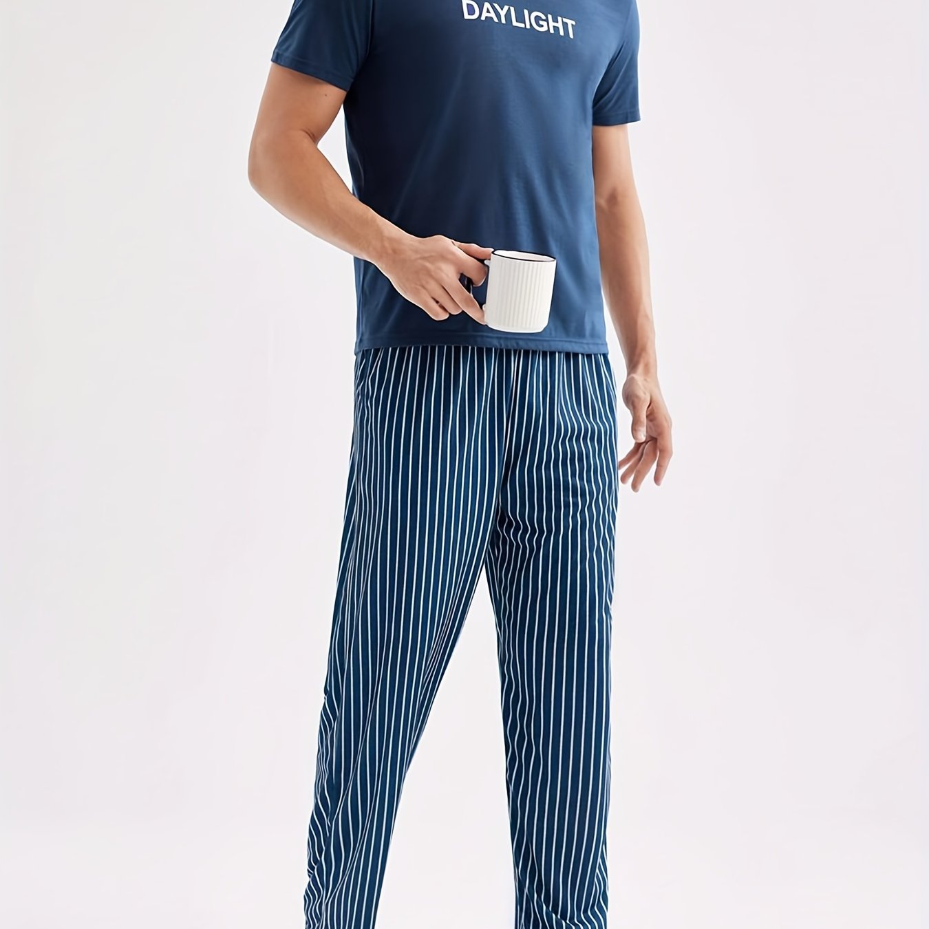 Men's Casual Crew Neck Short Sleeve Pajama Set with Striped Pants, made of 100% Polyester Knit Fabric, with Slight Stretch for All Season Comfort.