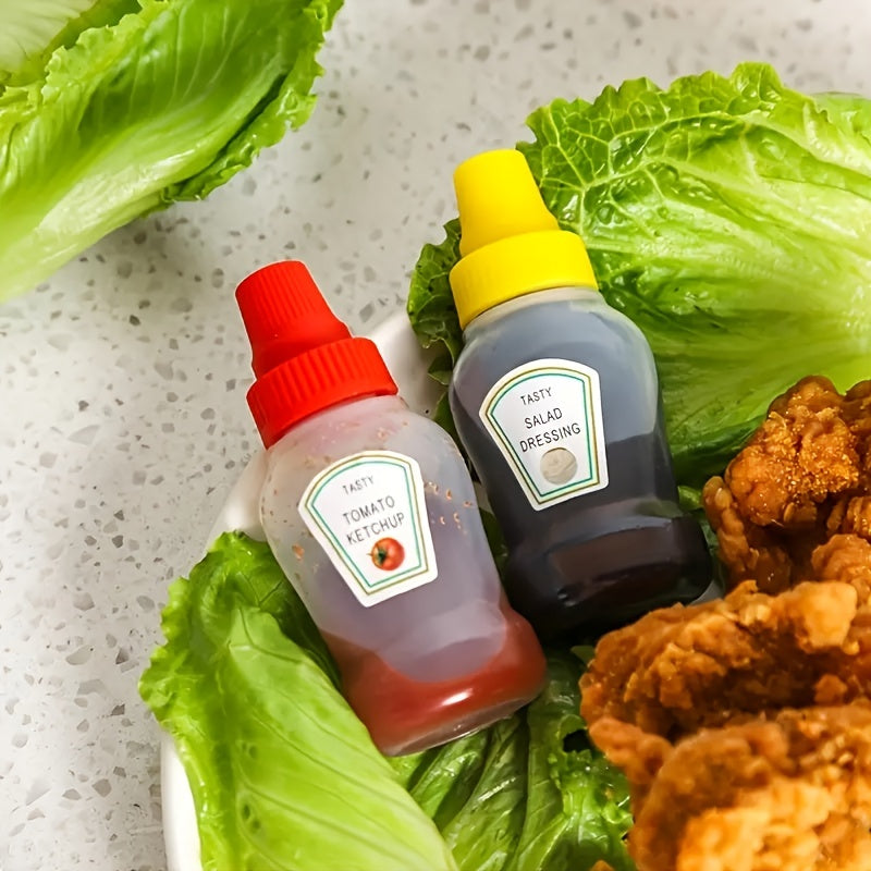 Set of 4 Portable Mini Sauce Bottles - Includes Honey, Ketchup, Mayonnaise, and Oil. Made from Food-Safe Plastic, Perfect for Camping, Office, School Lunches, or Car Sauce Holder.