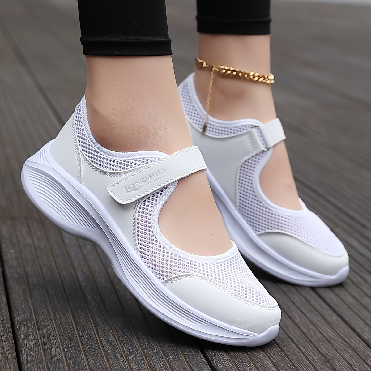 Comfortable slip-on sneakers for women with breathable mesh, supportive arch compression, lightweight non-slip sole, in white.