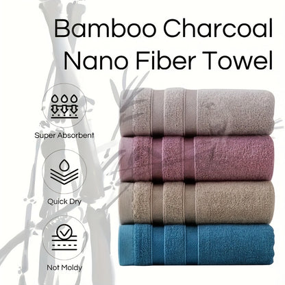 4-Pack of soft and absorbent bamboo hand towels for bathroom with a skin-friendly design featuring a contemporary striped pattern and space theme. Made with 70% bamboo fiber, 18% cotton, and 12% polyester, these towels have a weight of 420gsm and measure