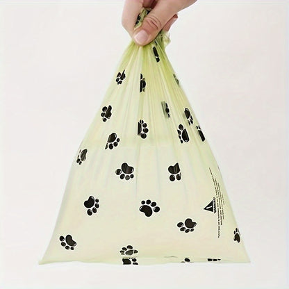 - 14 rolls of leak proof dog waste bags with cute paw print design for pet cleaning and outdoor use.