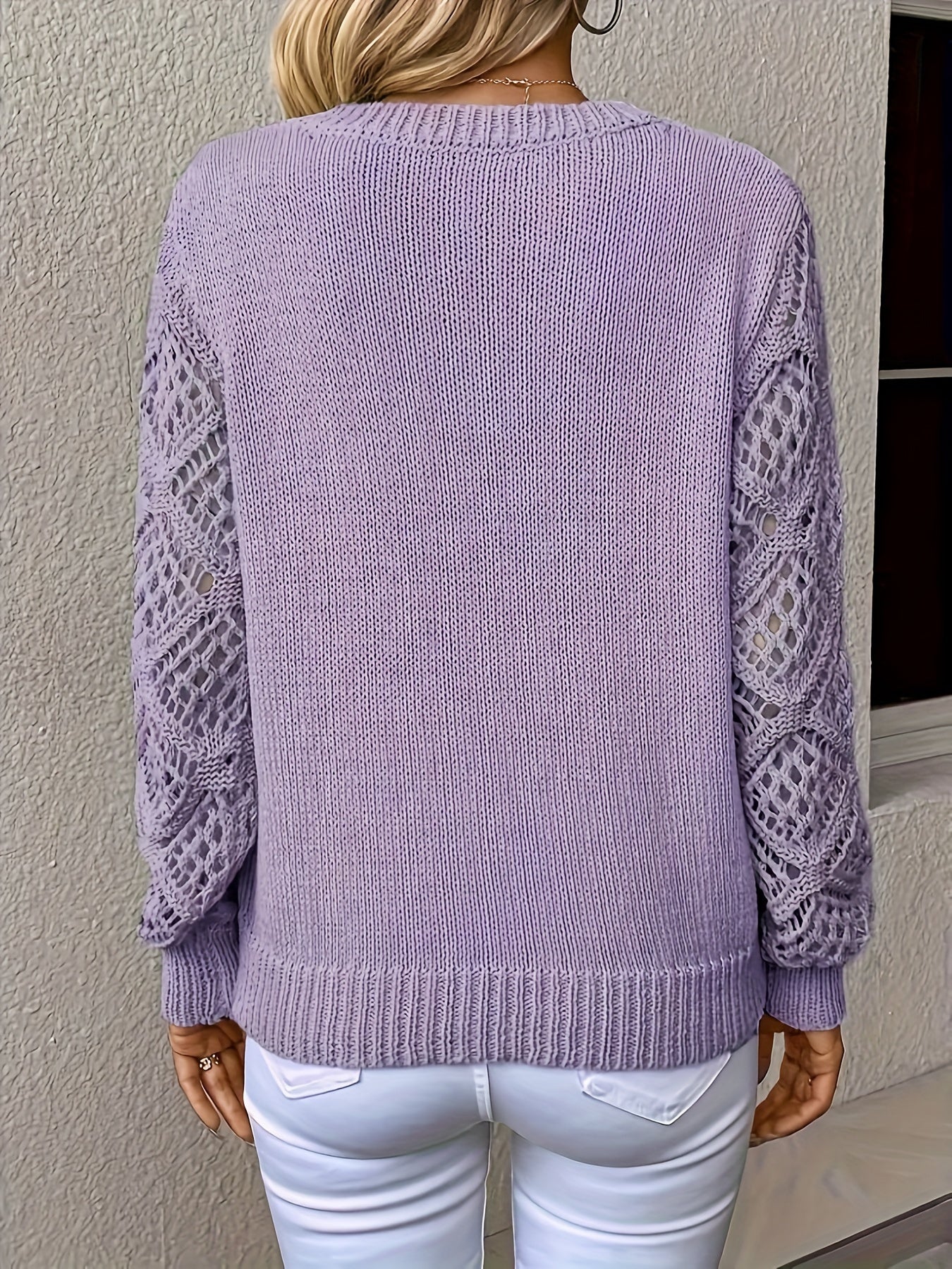 Pointelle knit sweater with V-neck and long sleeves, women's elegant clothing.