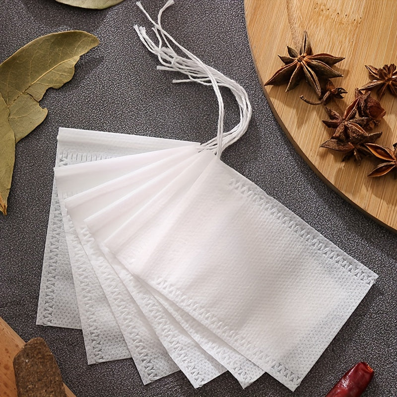 Pack of 10 or 20 Disposable Tea Filter Bags with Drawstring Closure, Made of Non-Woven Fabric for Brewing Tea and Spices