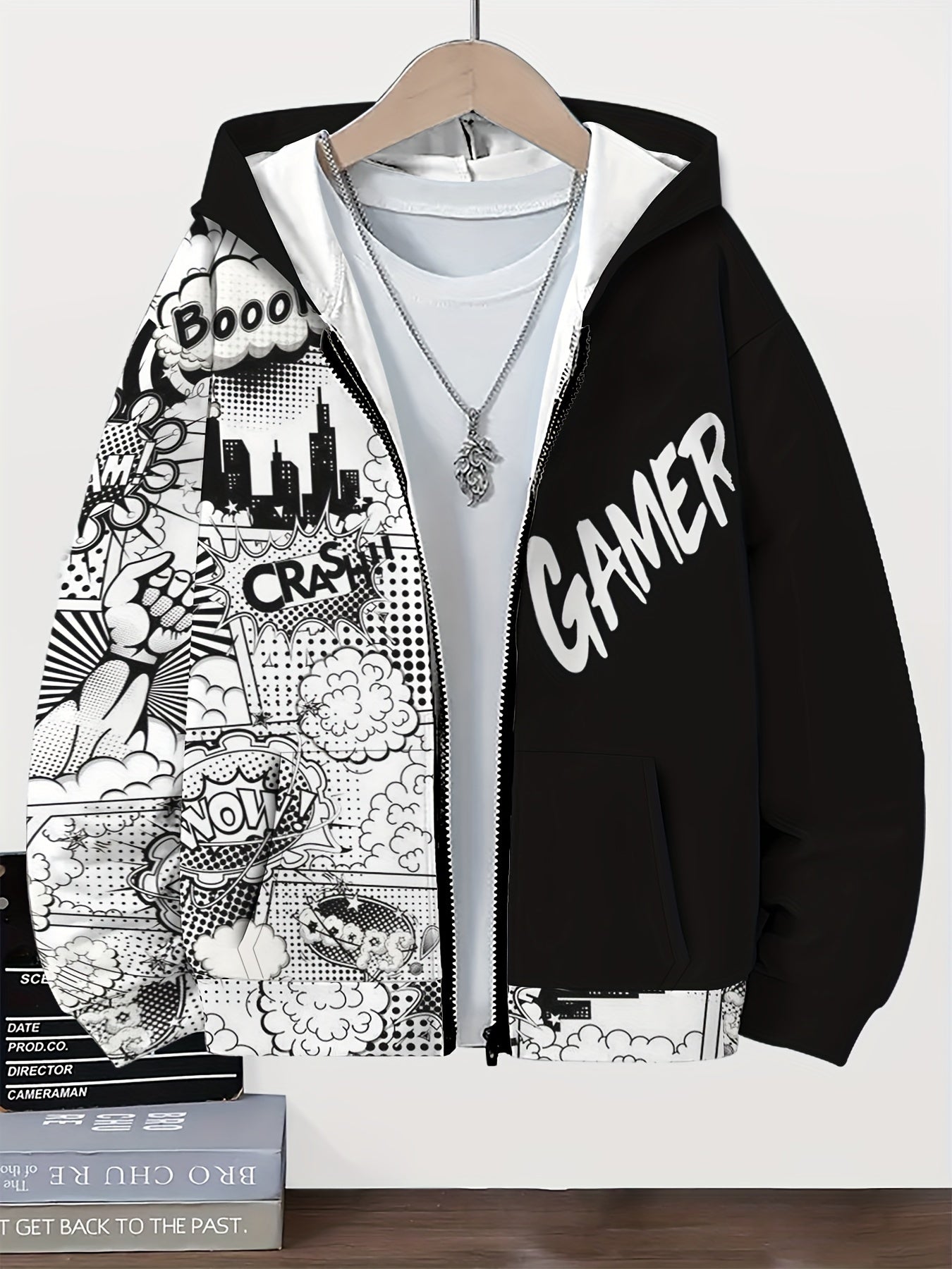 Boys' black and white gamer graphic hoodie with zip-up front, pockets, and cool print design for fall/winter casual wear. Playful style for teens, machine washable fabric.