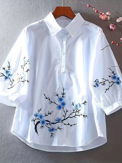 White floral embroidered shirt for women, made of polyester woven fabric with detailed embroidery and a collar design. Perfect for adult vacation style in spring/summer/autumn.