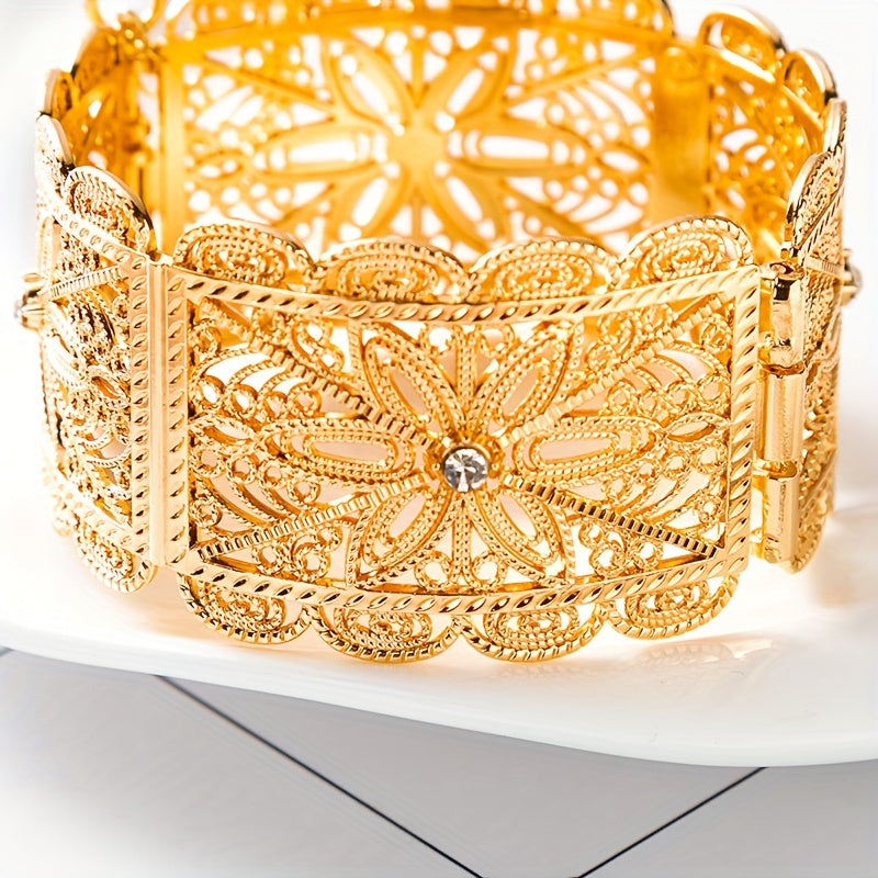 A luxurious gold-plated metal bracelet designed for women's jewelry, perfect for an Arab traditional festival, a bride's wedding ensemble, or as a beautiful wrist accessory.