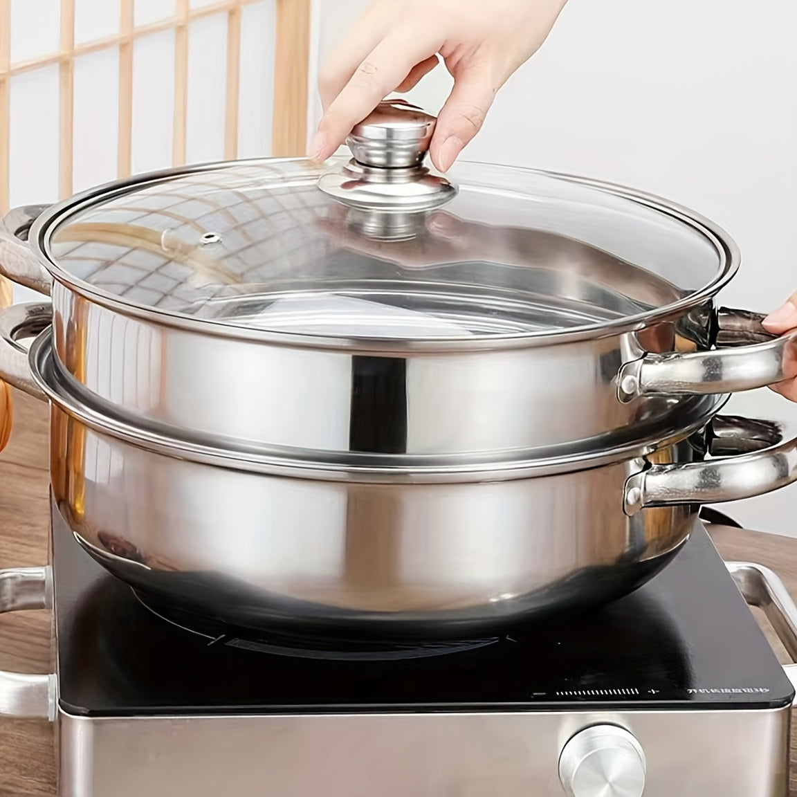 High-quality stainless steel double-layer steamer set suitable for both induction and gas stoves, ideal for cooking and entertaining.