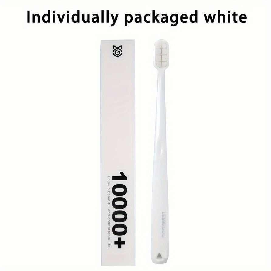 Premium manual toothbrush with soft bristles for gentle gum care. Black handle with gray/white bristles, individually wrapped for effective home oral care.