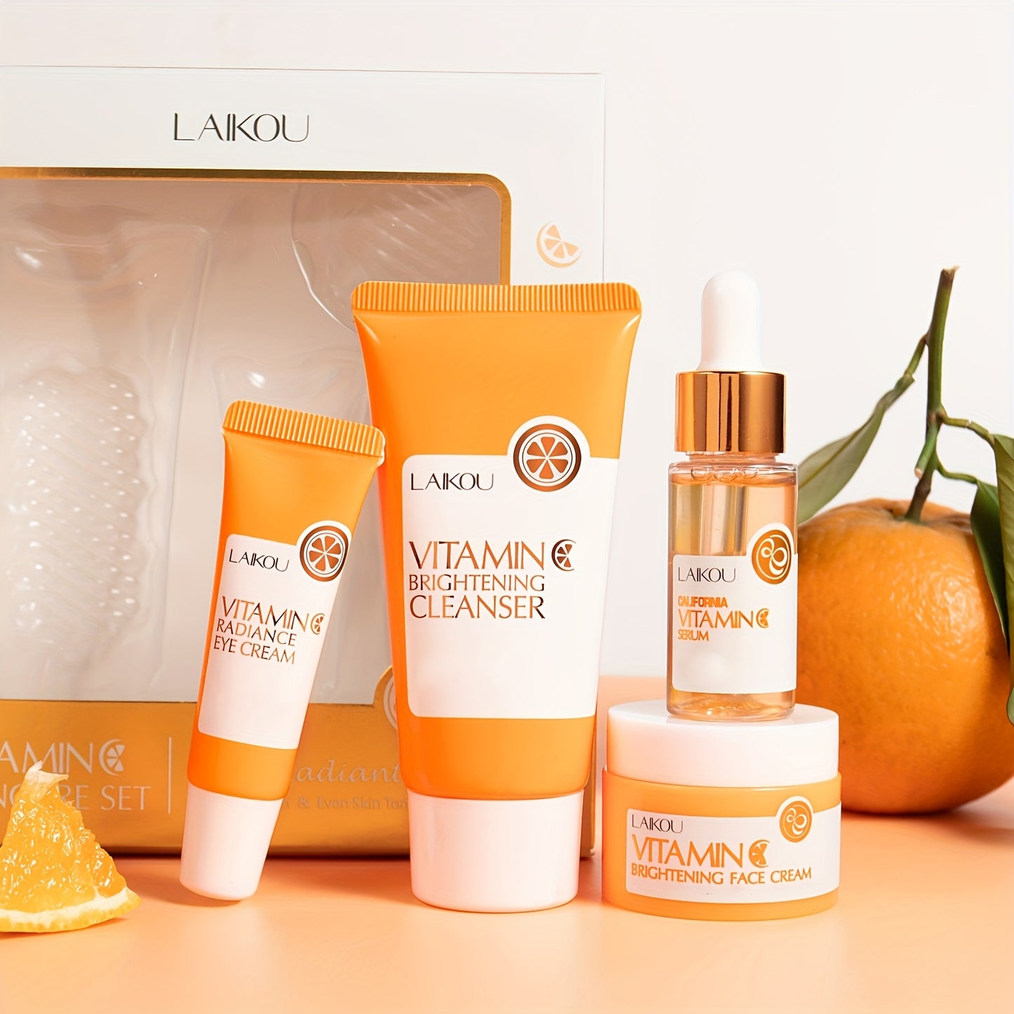 LAIKOU Vitamin C Skincare Gift Set includes 4 hydrating & moisturizing facial care products with hyaluronic acid, suitable for all skin types.