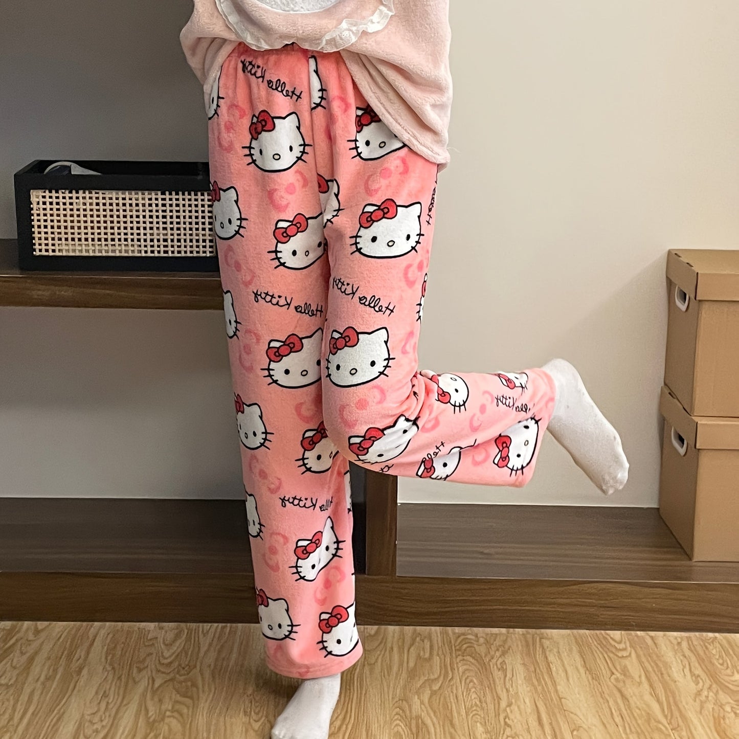 Sanrio Hello Kitty cozy flannel pajamas for women, officially licensed and perfect for relaxing and sleepwear.