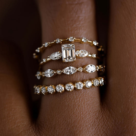 Set of four stunning gold cubic zirconia stacking rings designed for women, offering an elegant and luxurious style. Perfect for engagements, anniversaries, and as a daily or party wear accessory.