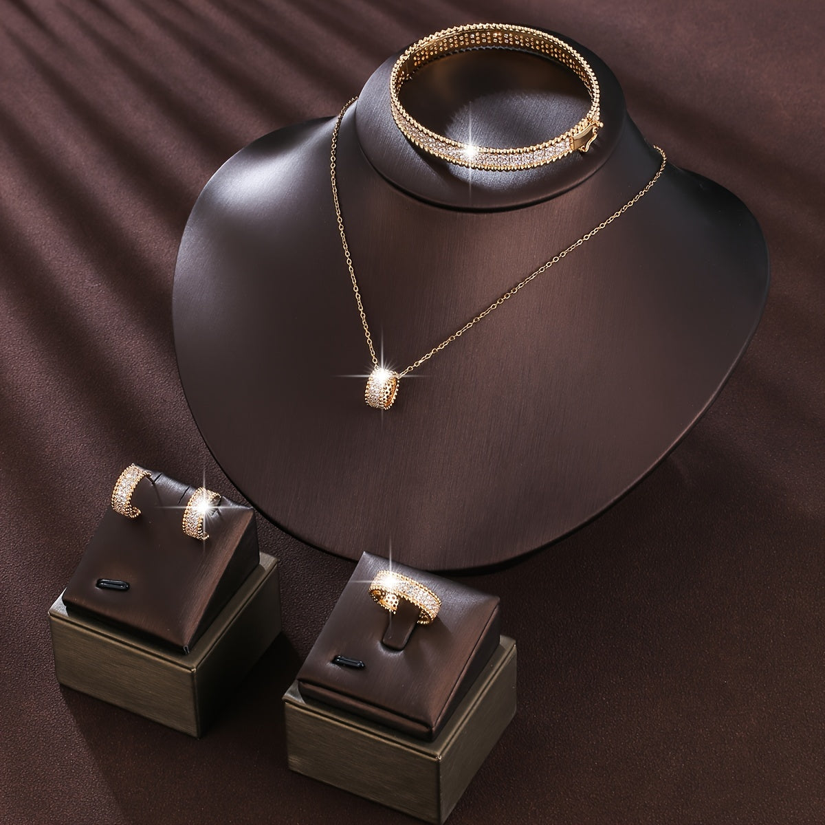 Simple and elegant jewelry set for girls featuring rings, earrings, necklaces, and bracelets with a sleek and luxurious design.